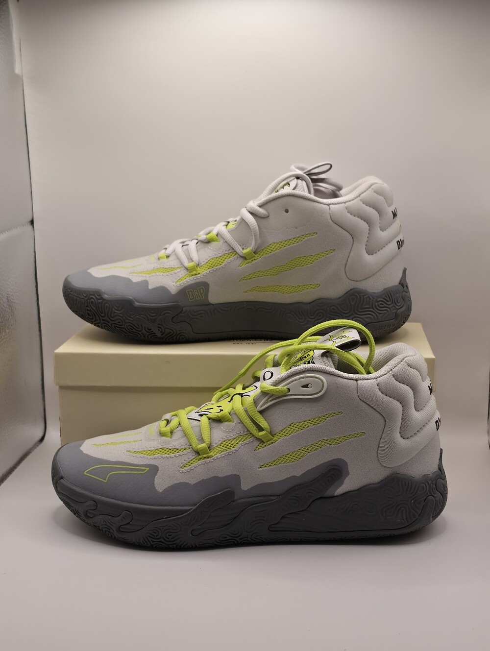 Puma x LaMelo Ball MB.03 "Chino Hills" sneakers. Feather gray and lime Youth 7
